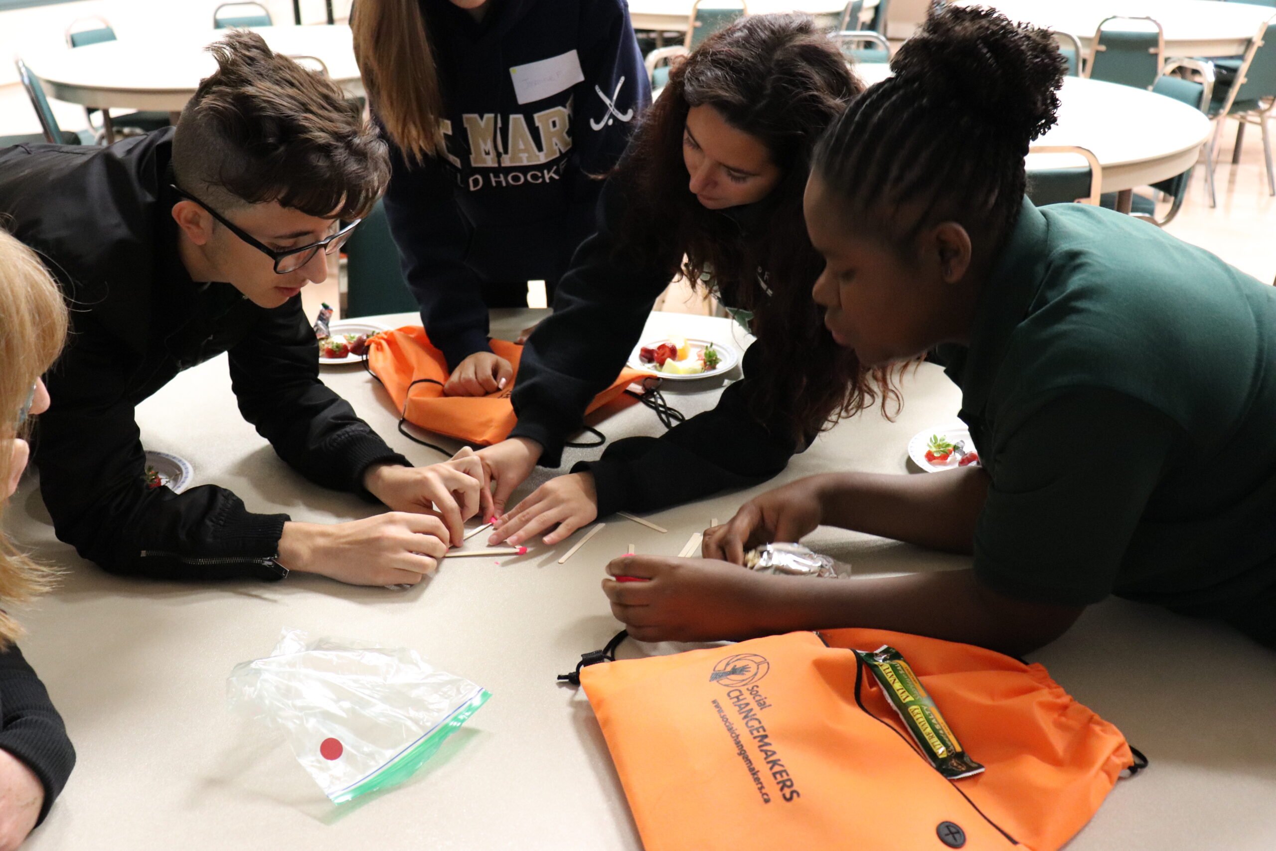 Students gathered around an activity